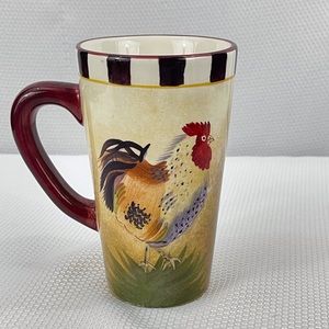 The Sakura Table Chanticleer Sally Eckman Robert's 16oz Rooster Mug.
